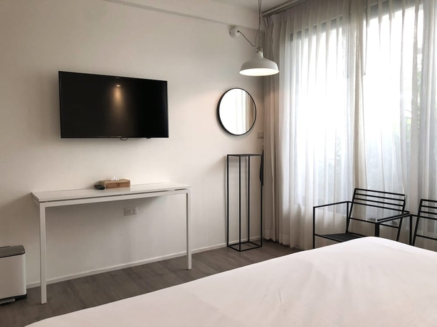 Imagen de la habitación del Hotel Por Santitham. Foto 18