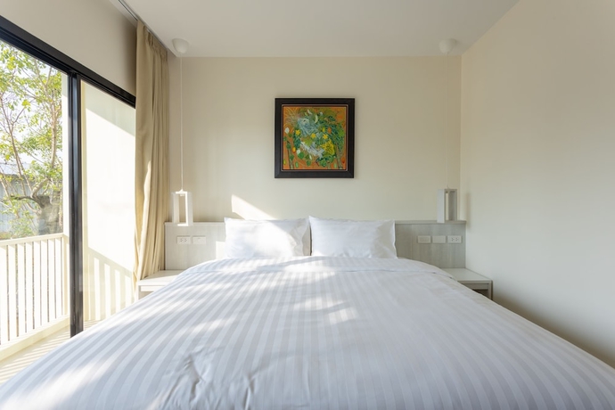 Imagen de la habitación del Hotel Porestva Sriracha. Foto 2