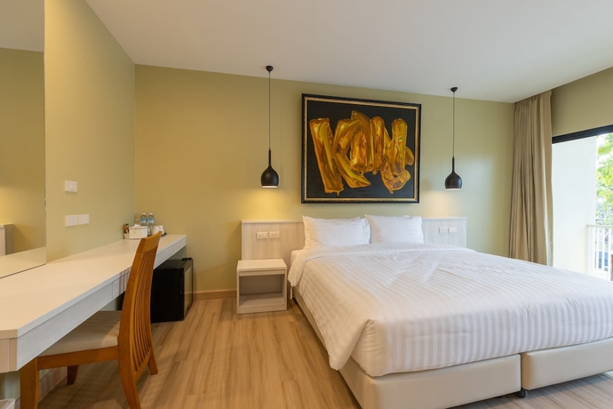 Imagen de la habitación del Hotel Porestva Sriracha. Foto 11