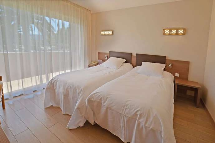 Imagen de la habitación del Hotel Poretta. Foto 2