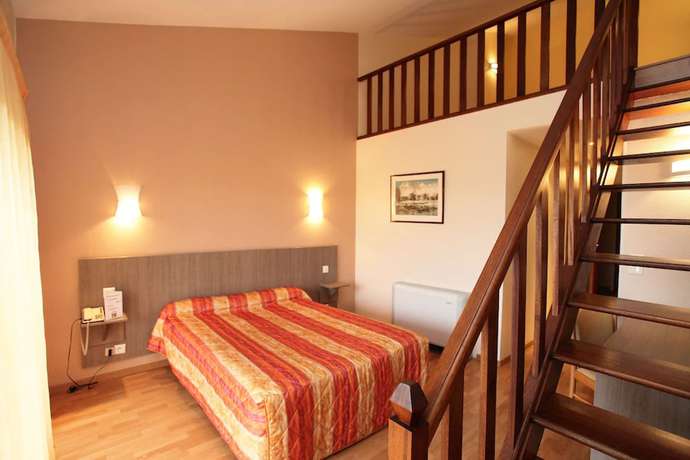 Imagen de la habitación del Hotel Poretta. Foto 6