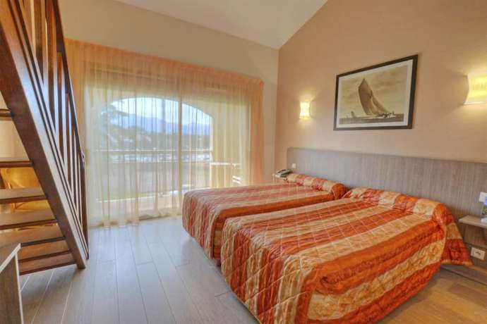 Imagen de la habitación del Hotel Poretta. Foto 8