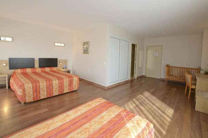 Imagen de la habitación del Hotel Poretta. Foto 10
