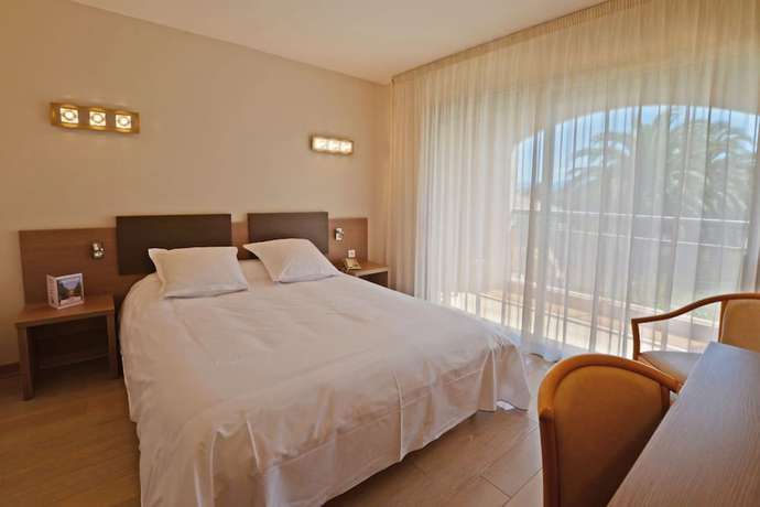 Imagen de la habitación del Hotel Poretta. Foto 11