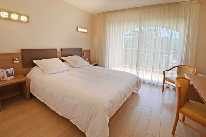 Imagen de la habitación del Hotel Poretta. Foto 12