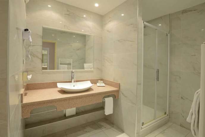 Imagen de la habitación del Hotel Poretta. Foto 16