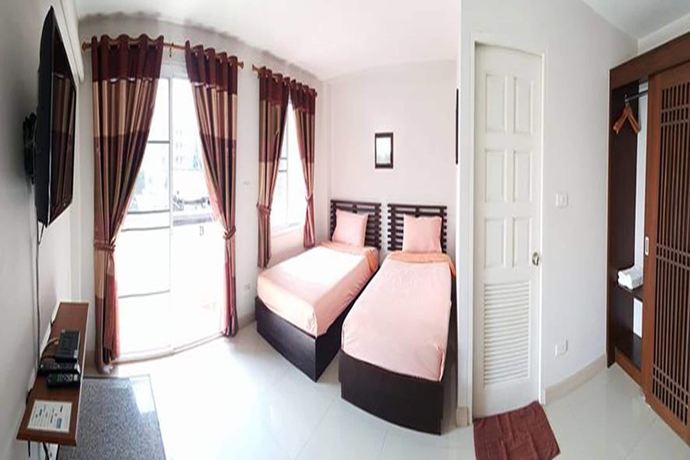 Imagen de la habitación del Hotel Pornkasem House. Foto 7