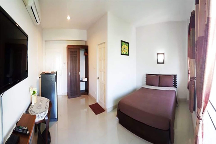 Imagen de la habitación del Hotel Pornkasem House. Foto 8