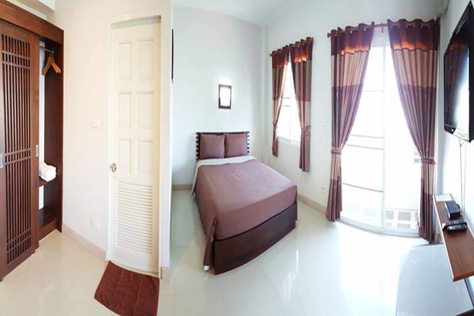 Imagen de la habitación del Hotel Pornkasem House. Foto 9