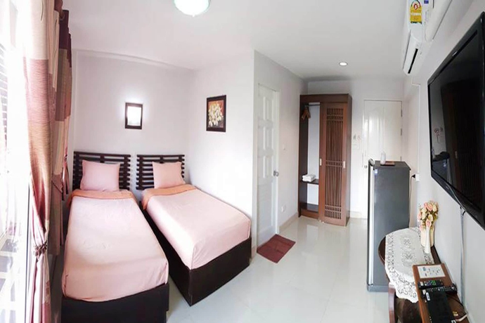 Imagen de la habitación del Hotel Pornkasem House. Foto 10