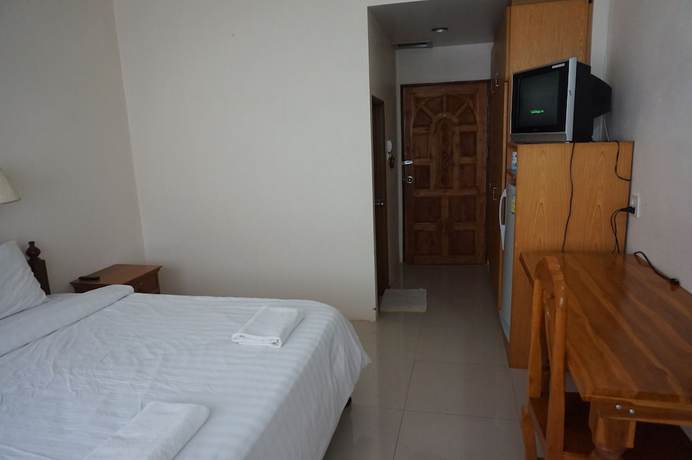 Imagen de la habitación del Hotel Pornnarumirt. Foto 9