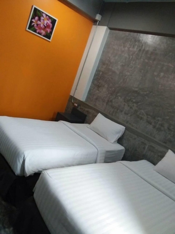 Imagen de la habitación del Hotel Pornsiri Sisaket. Foto 11