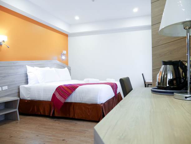 Imagen de la habitación del Hotel Porpiang. Foto 16