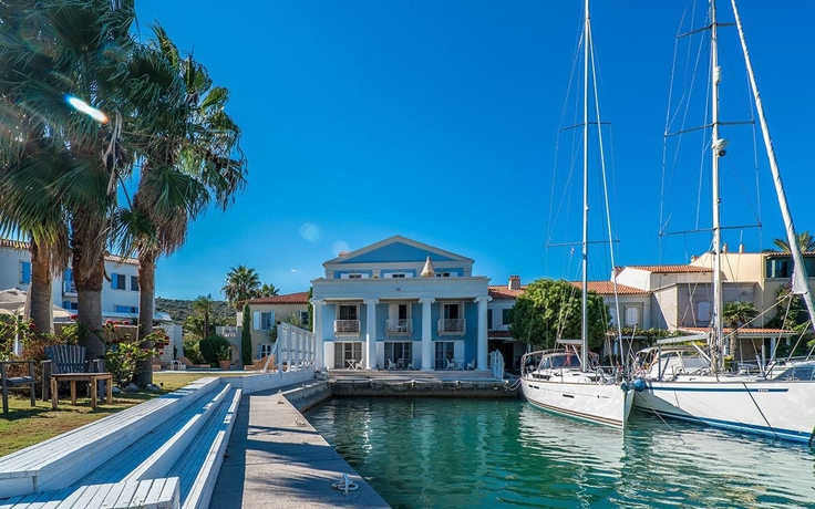 Imagen de los exteriores del Hotel Port Alacati. Foto 13
