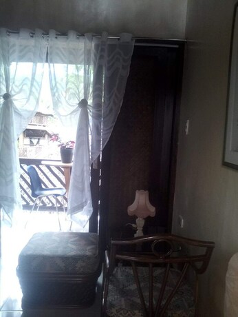 Imagen de la habitación del Hotel Port Barton Le Cou De Tou Village Resort. Foto 20