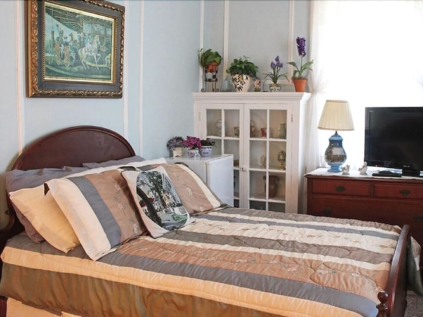 Imagen de la habitación del Hotel Port City Guest House. Foto 10