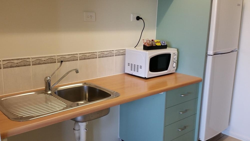 Imagen de la habitación del Hotel Port Denison Motor Inn. Foto 17