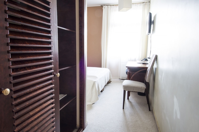 Imagen de la habitación del Hotel Port Hotel. Foto 11