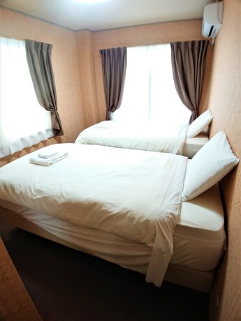 Imagen de la habitación del Hotel Port House. Foto 18