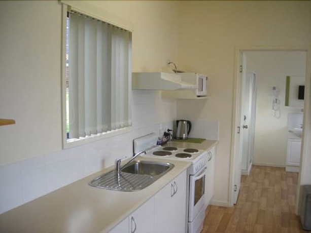 Imagen de la habitación del Hotel Port Huon Cottages. Foto 9