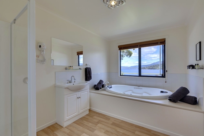 Imagen de la habitación del Hotel Port Huon Cottages. Foto 12