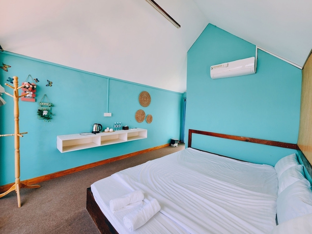 Imagen de la habitación del Hotel Port Ville Resort. Foto 8