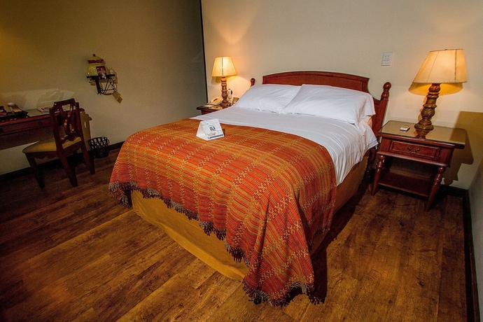 Imagen de la habitación del Hotel Porta Antigua. Foto 9