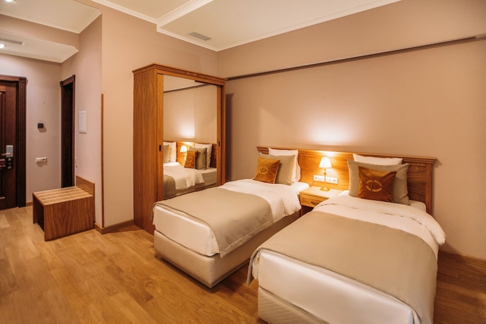 Imagen de la habitación del Hotel Porta Caucasia. Foto 4