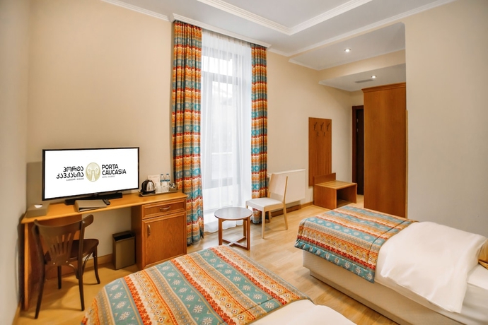 Imagen de la habitación del Hotel Porta Caucasia. Foto 10