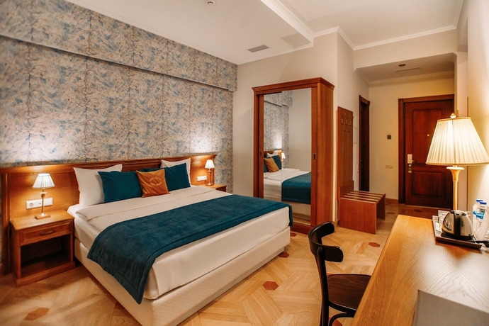Imagen de la habitación del Hotel Porta Caucasia. Foto 16