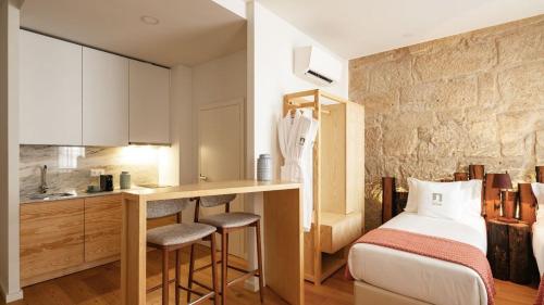 Imagen de la habitación del Hotel Porta Nobre - Exclusive Living. Foto 18