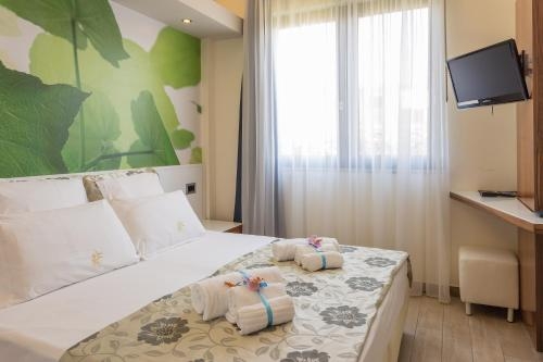 Imagen de la habitación del Hotel Porta Rosa. Foto 9