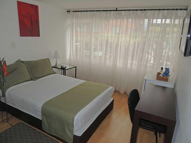 Imagen de la habitación del Hotel Portal De Milán. Foto 11