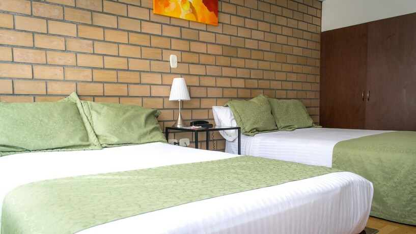 Imagen de la habitación del Hotel Portal De Milán. Foto 16