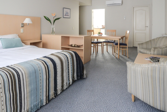 Imagen de la habitación del Hotel Portal Plaza Suites. Foto 7