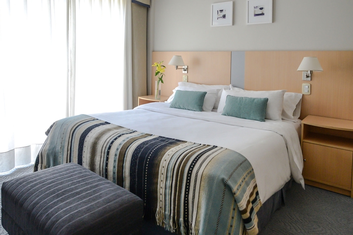 Imagen de la habitación del Hotel Portal Plaza Suites. Foto 8