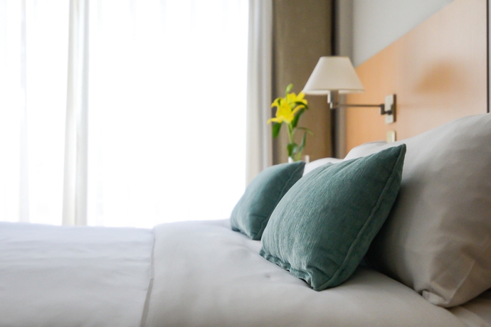 Imagen de la habitación del Hotel Portal Plaza Suites. Foto 11