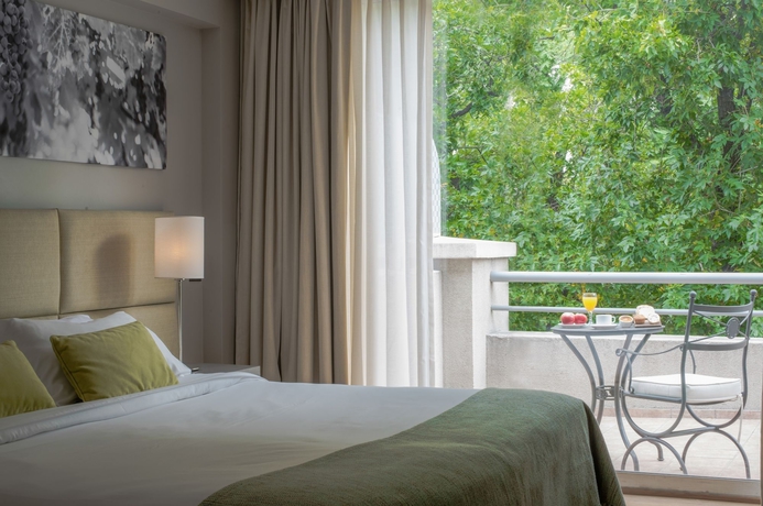 Imagen de la habitación del Hotel Portal Plaza Suites. Foto 13