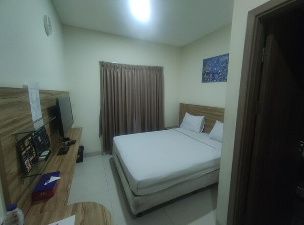 Imagen de la habitación del Hotel Portal Residence. Foto 20
