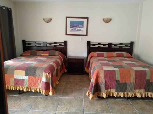 Imagen de la habitación del Hotel Portal de Occidente. Foto 14
