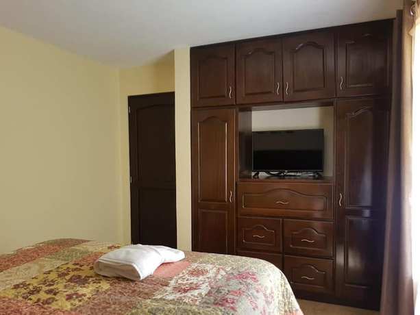 Imagen de la habitación del Hotel Portal de Occidente. Foto 17
