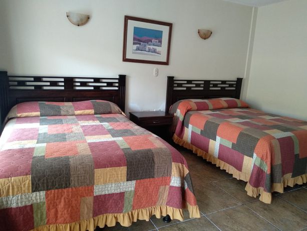 Imagen de la habitación del Hotel Portal de Occidente. Foto 18