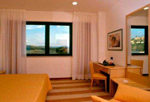 Imagen de la habitación del Hotel Portavaldera. Foto 14
