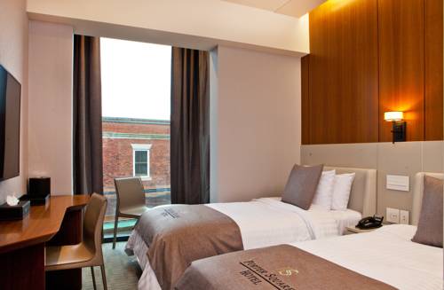 Imagen de la habitación del Hotel Porter Square. Foto 2