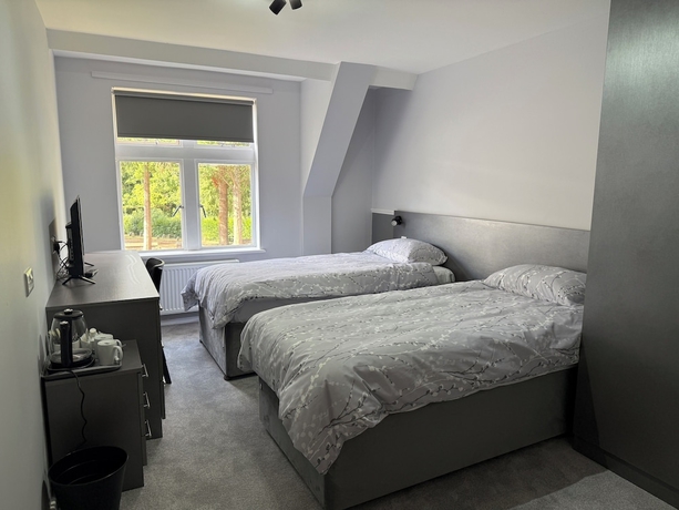 Imagen de la habitación del Hotel Porters Lodge. Foto 7