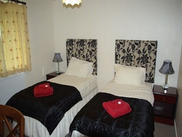 Imagen de la habitación del Hotel Porth Lodge. Foto 6