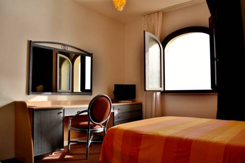 Imagen de la habitación del Hotel Porthotel Calandra. Foto 1