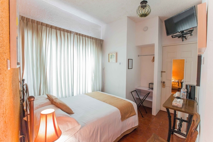 Imagen de la habitación del Hotel Portico Cultural. Foto 9