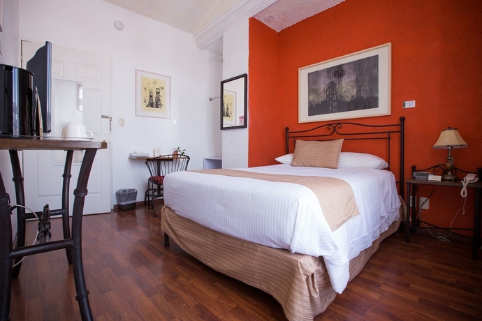 Imagen de la habitación del Hotel Portico Cultural. Foto 12