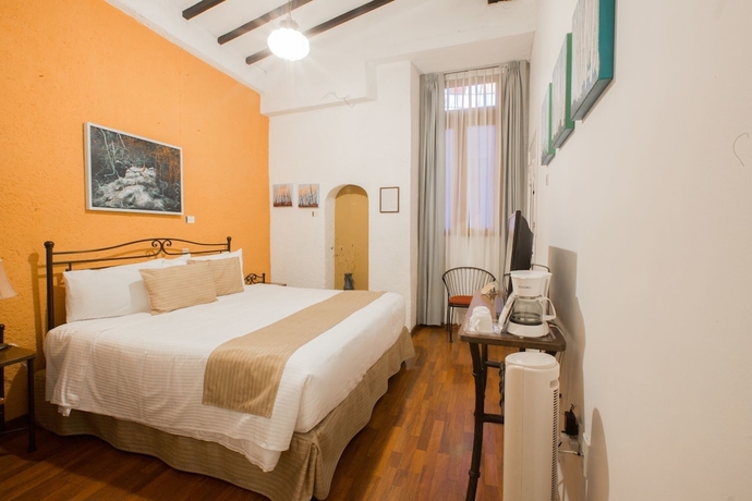 Imagen de la habitación del Hotel Portico Cultural. Foto 14